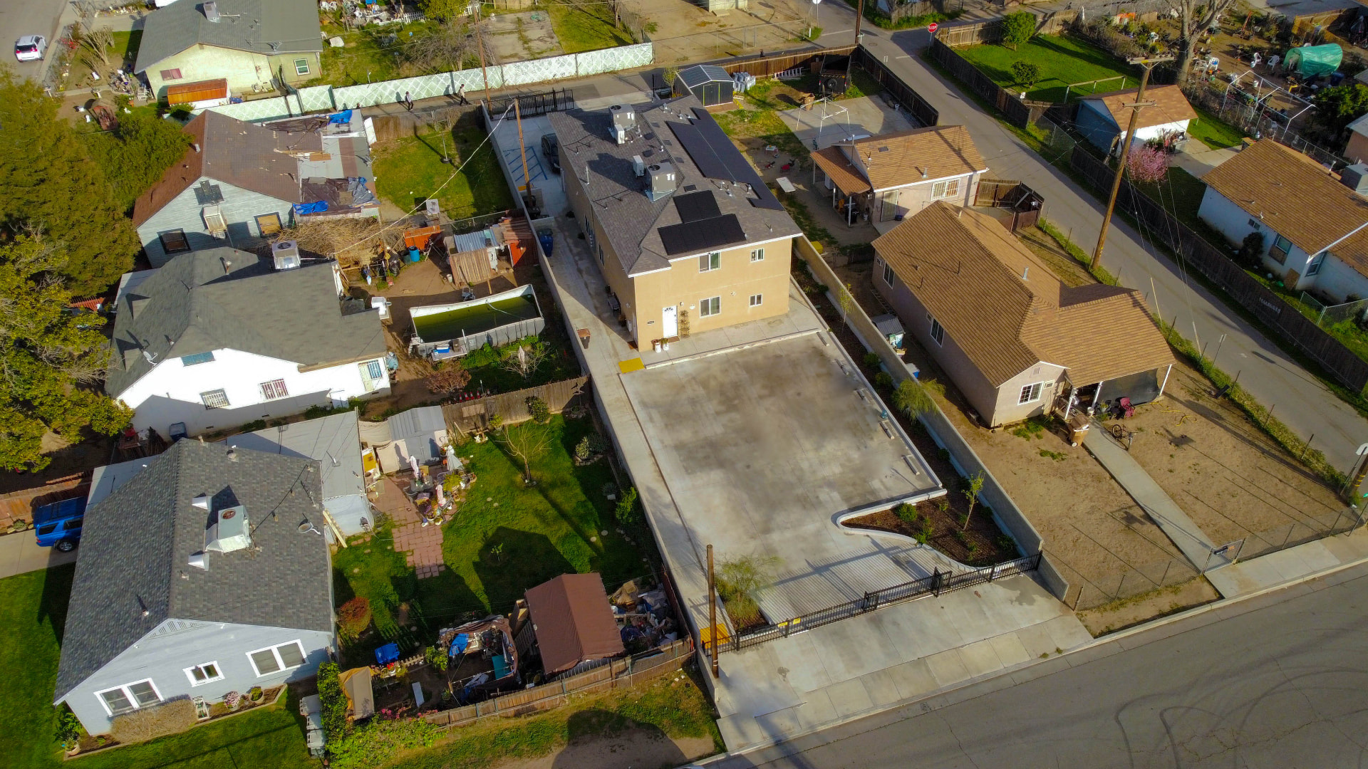 Wide angled aerial of the property and surrounding block