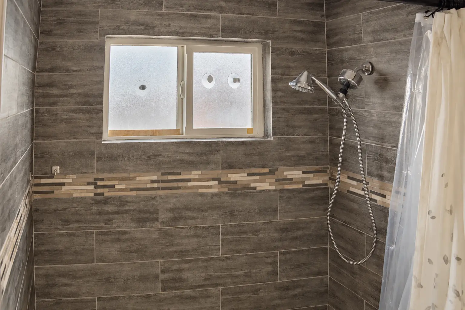 Tiled walk-in shower detail